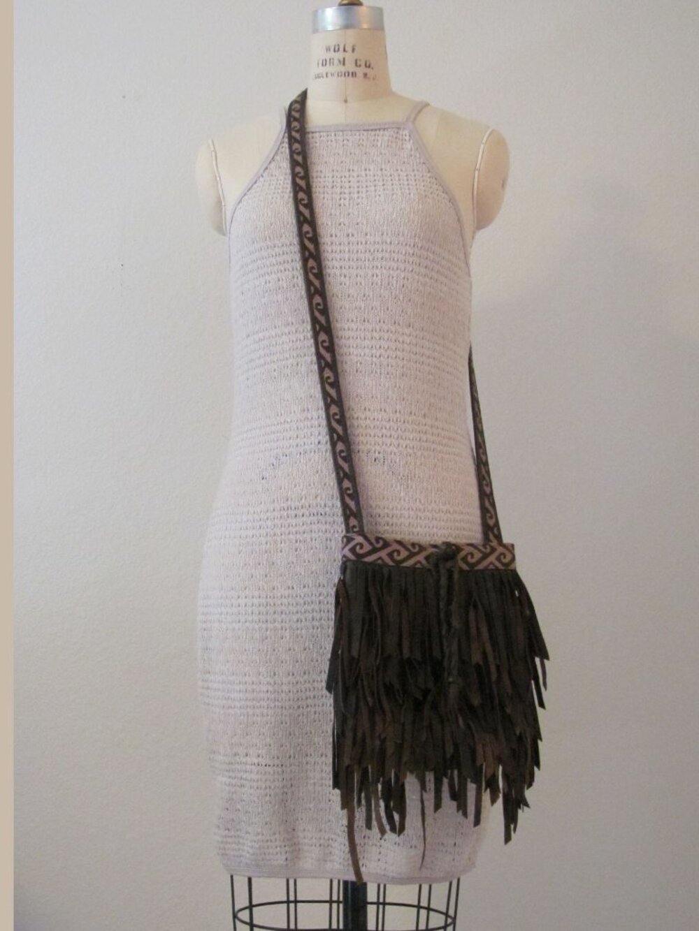 Small Lucky Brand leather crossbody purse with fringe,
